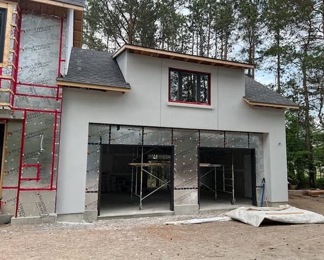 Ozwan Stucco team at work